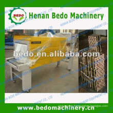PE film heat shrink wrapping machine for wood briquettes 008613592516014
